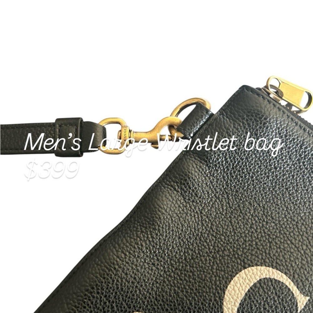 Gucci Black Leather Large Unisex Wristlet Bag.